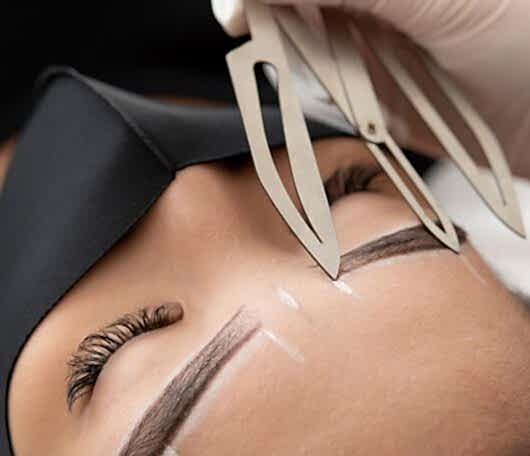 beautician-working-client-s-eyebrows
